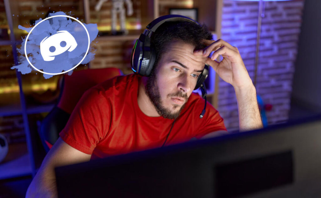 Streamer estresado delante del ordenador Discord