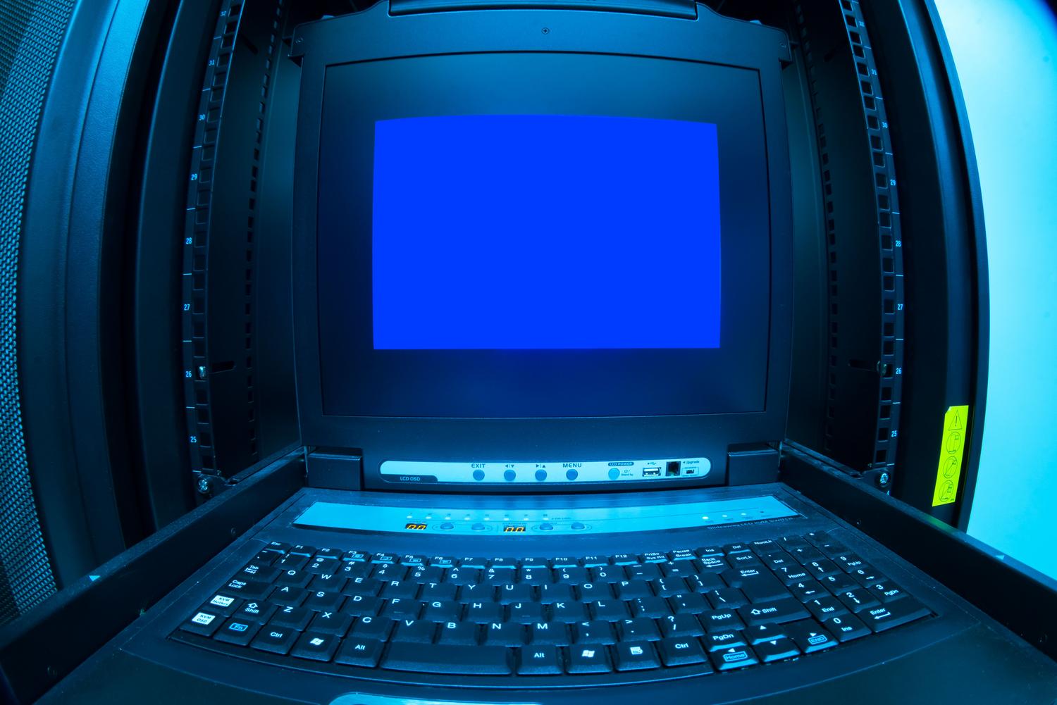Server console showing a blue screen, symbolizing system downtime, critical error, or a service being unreachable.