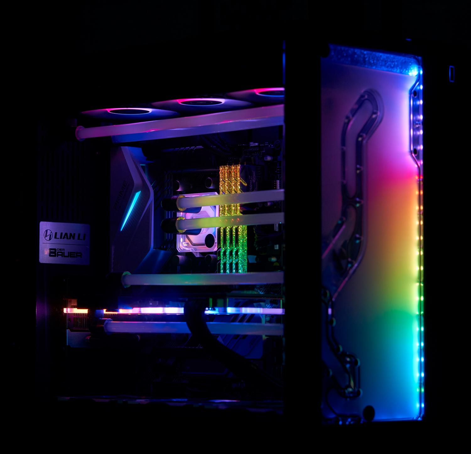 PC gaming de alto rendimiento con iluminación RGB vibrante y componentes internos visibles.