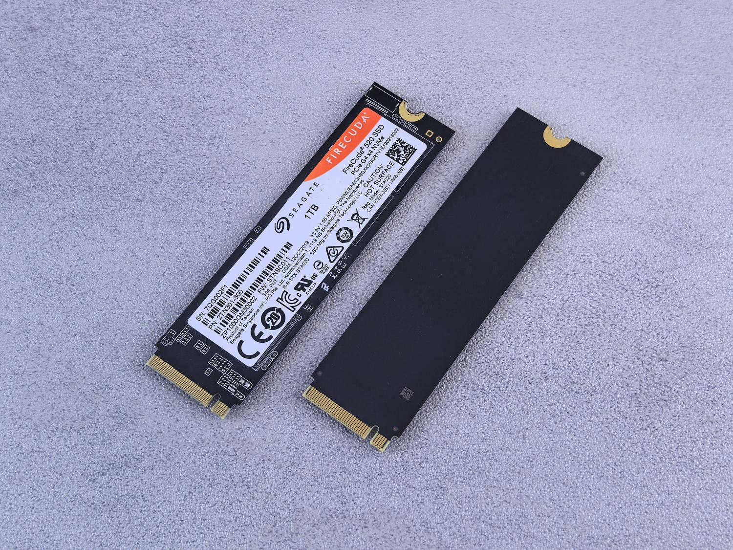 Two high-performance Seagate FireCuda NVMe SSDs on a gray background, highlighting their compact design and PCIe Gen4 technology.