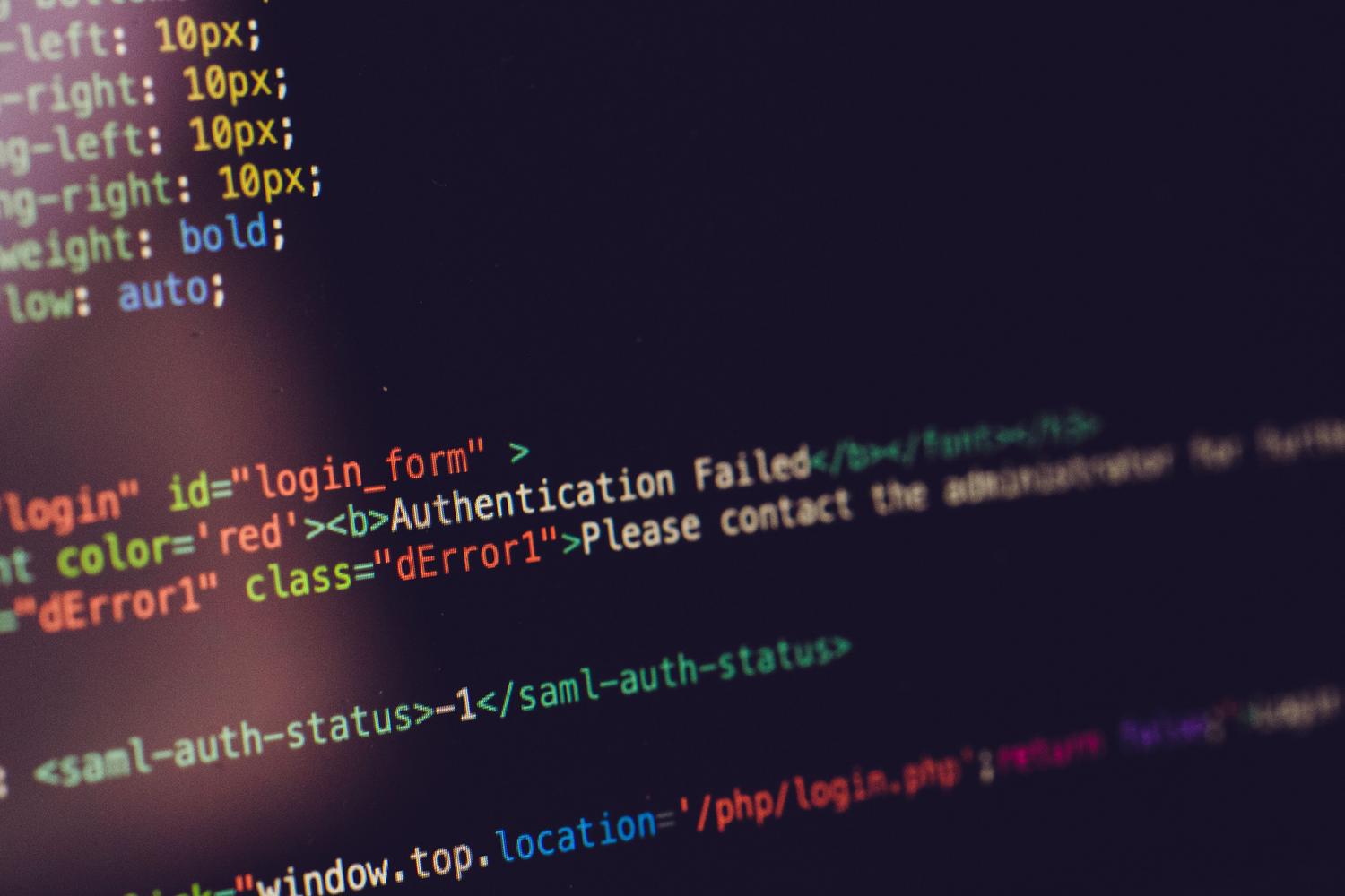Detalle de una pantalla con código informático y un mensaje de error, ilustrando la naturaleza técnica del fallo de codificación de caracteres.
