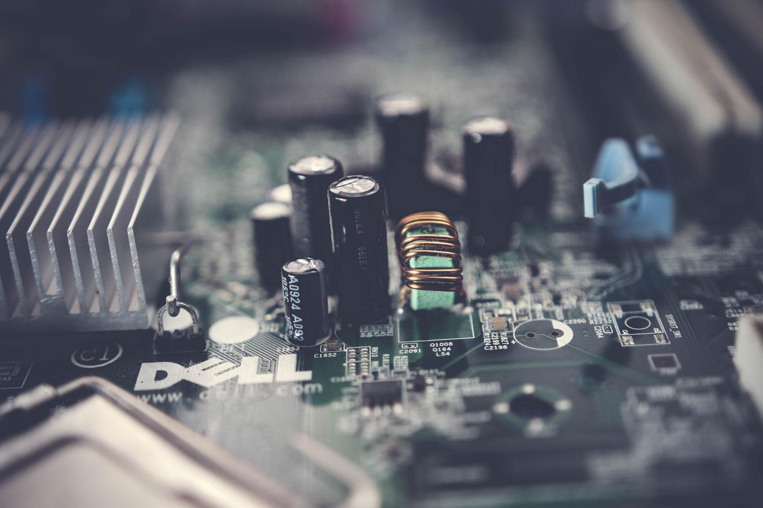 Detailed close-up of a computer motherboard, depicting the hardware controllers.